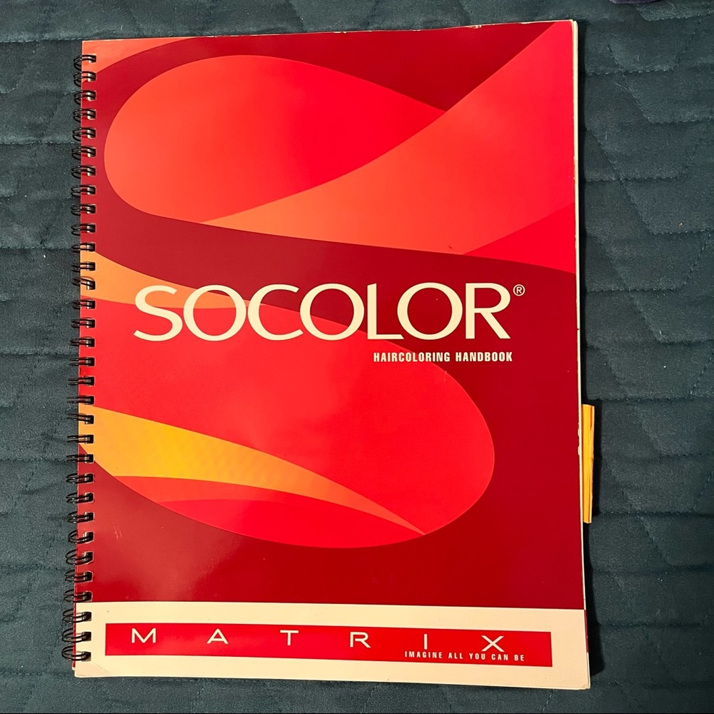 Matrix Socolor Swatchbook and Haircoloring Handbook.